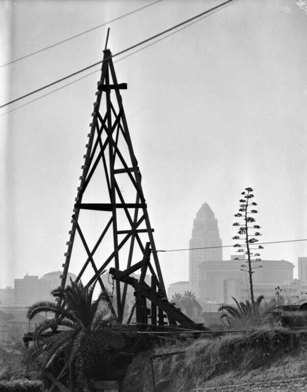 KNOW YOUR CITY, NO.82 -- Naturally, you can guess what this is. But, where you get around to where it is, you run into some interesting stuff. (That City Hall tower ruins more mysteries!)

ANSWER: Well, it's one of those old oil wells that are on the