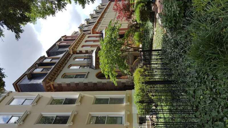 Second Empire-style Victorian town houses line the streets of Lafayette Square