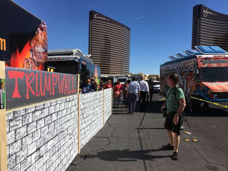 Taco trucks form the Wall of Tacos demonstration in front of the Trump International Hotel Las Vegas before the last 2016 U.S. presidential debate in Las Vegas, Nevada, Oct. 19, 2016