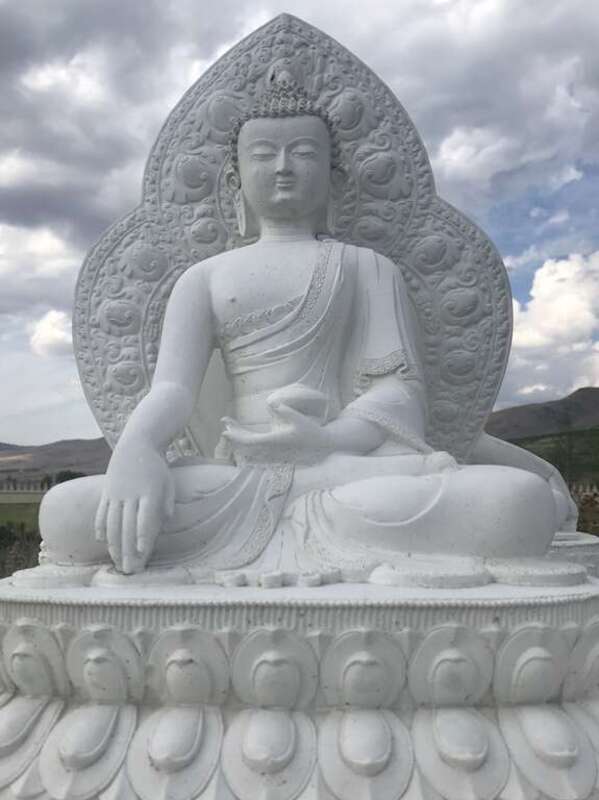 Garden of One Thoisand Buddhas - hand cast Buddha’s are displayed around a central figure of Yum Chenmo (the Great Mother)