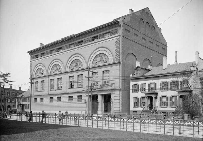 Yale University gymnasium, the campus' second, on the present-day site of Trumbull College dining hall. Constructed from 1890 to 1892, and demolished around 1931 for the new college (also known as the Sterling Quadrangle). View from the lawn of the