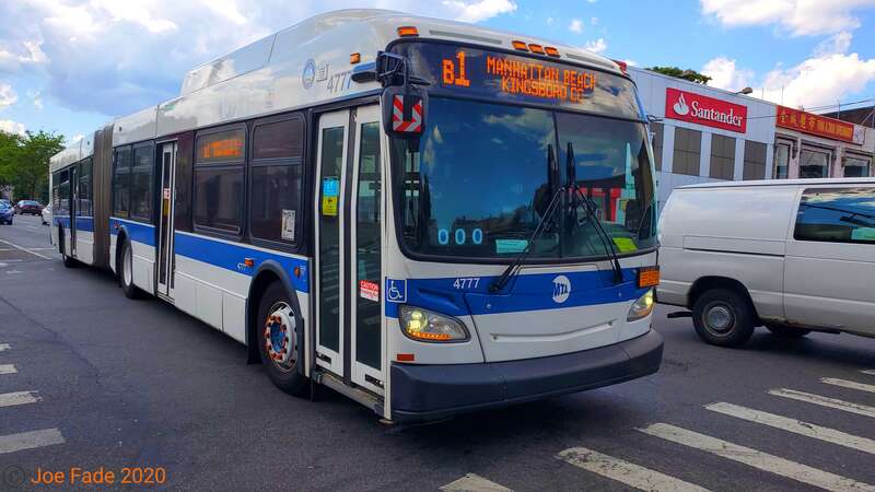 A Manhattan Beach bound B1 bus arrives at the 18th Avenue bus stop.