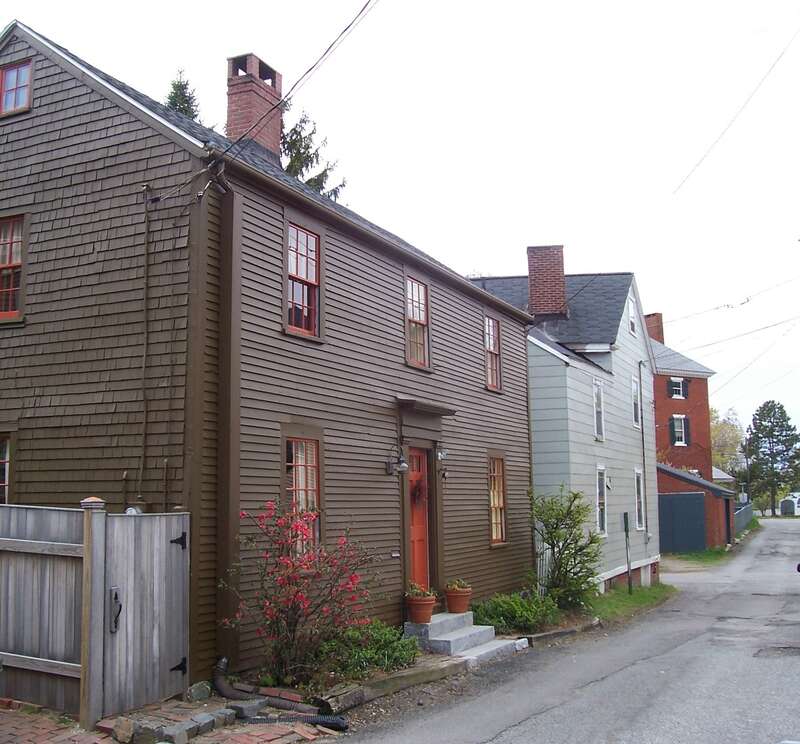 old homes mixed with newer along narrow streets. Haven Park can be seen at the end of the road.
Gates Street, Portsmouth, NH
The neighborhood's history traces back to 1630, when Captain Walter Neal chose the area to build a settlement, naming it