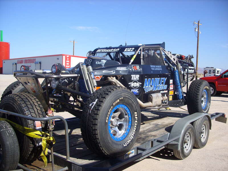 The Class 1 buggy of Derek Marley sits on a trailer at the Yurba Mountain Travel Center along RT 95 in Nevada on the way to the start of the 2008 Vegas to Reno. Boy Scout Venture Crew 35 is going to rebuild a Ford Ranger to race in Best In The