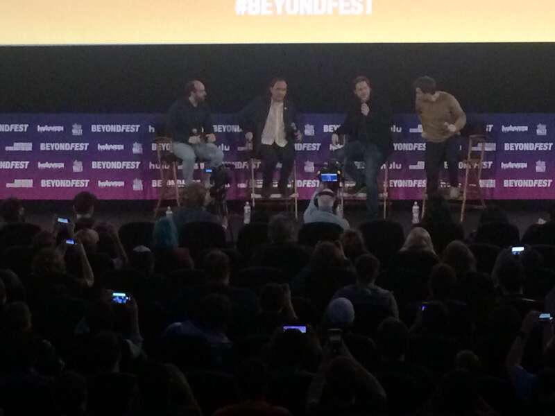 Nathan Fielder welcoming Tim Heidecker, Eric Notarnicola, and Gregg Turkington at the Mister America panel.