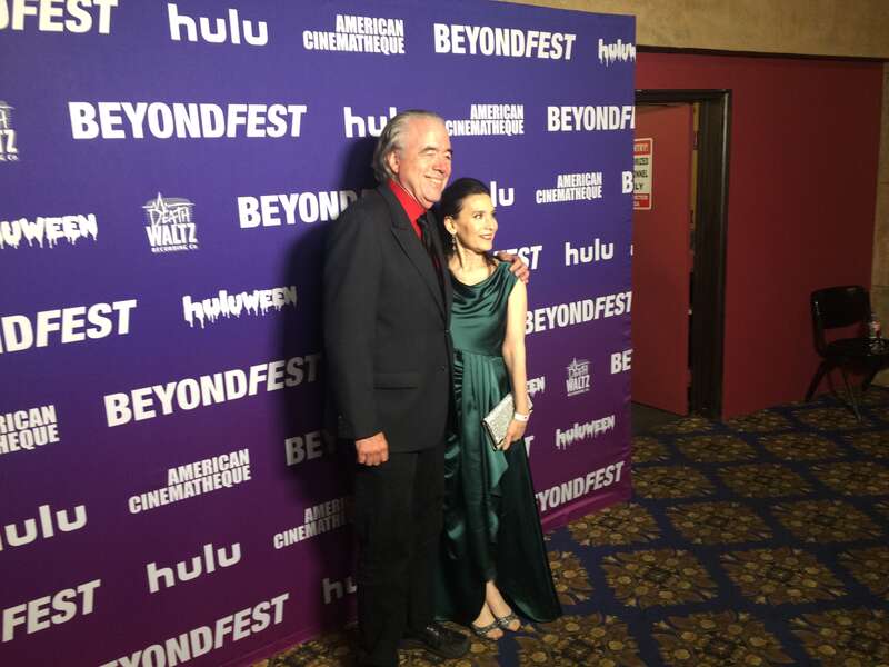 Terri Newman and Curtis Webster posing at the Mister America film premiere.
