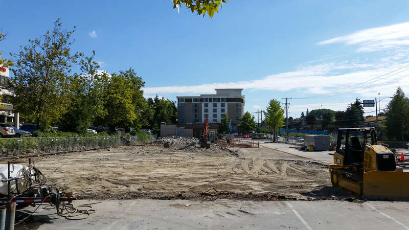 Buildings of a strip mall called Northgate Station have been demolished for a staging/parking area for the future Northgate Station (light rail) under construction