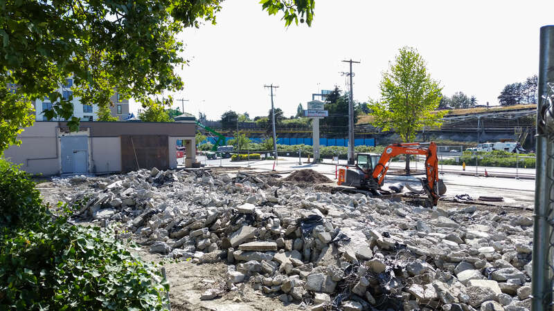 Buildings of a strip mall called Northgate Station have been demolished for a staging/parking area for the future Northgate Station (light rail) under construction