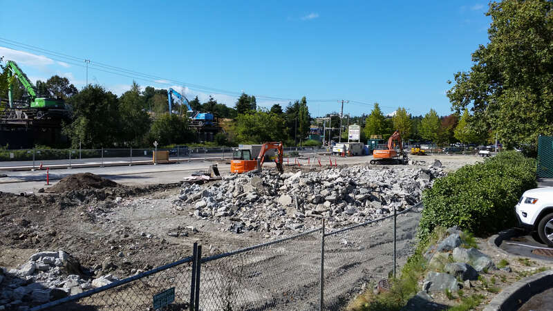 Buildings of a strip mall called Northgate Station have been demolished for a staging/parking area for the future Northgate Station (light rail) under construction