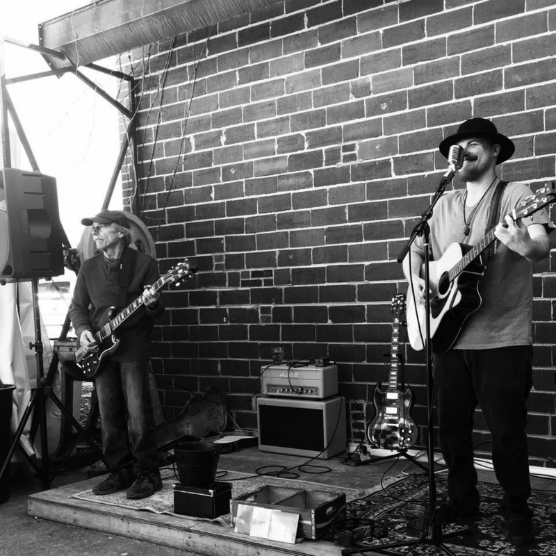 Pat Ryan Key and Al Halpin performing live music.