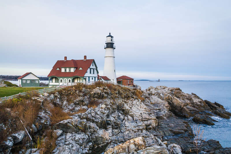 I will add another to the encyclopedic mass of photos of this light house.  It is located in Cape Elizabeth south of Portland, Maine.  We had out of state visitors we were entertaining.
In the distance is Ram Island Light
Portland Head Light is an
