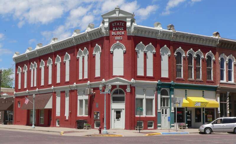 State Bank Block, located at northwest corner of 4th Avenue and Webster Street in Red Cloud, Nebraska.  4th is at left; Webster is at right.  The building was constructed in 1883.  It is part of Red Cloud's Main Street Historic District, which is