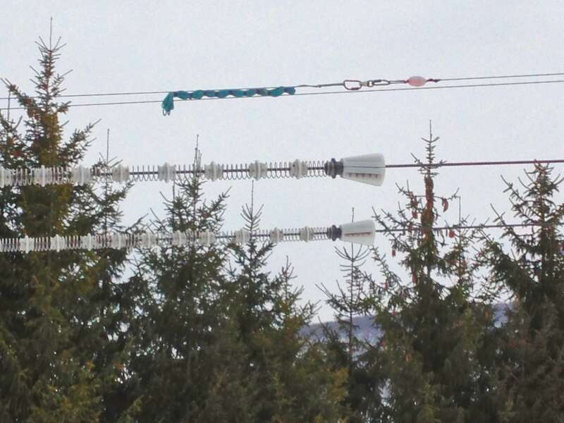 Zip line spring braking system. The springs will be compressed as the trolley comes into contact. There is an impact pad which will lock the mechanism when springs are compressed to prevent them from uncompressing which will cause the trolley to be