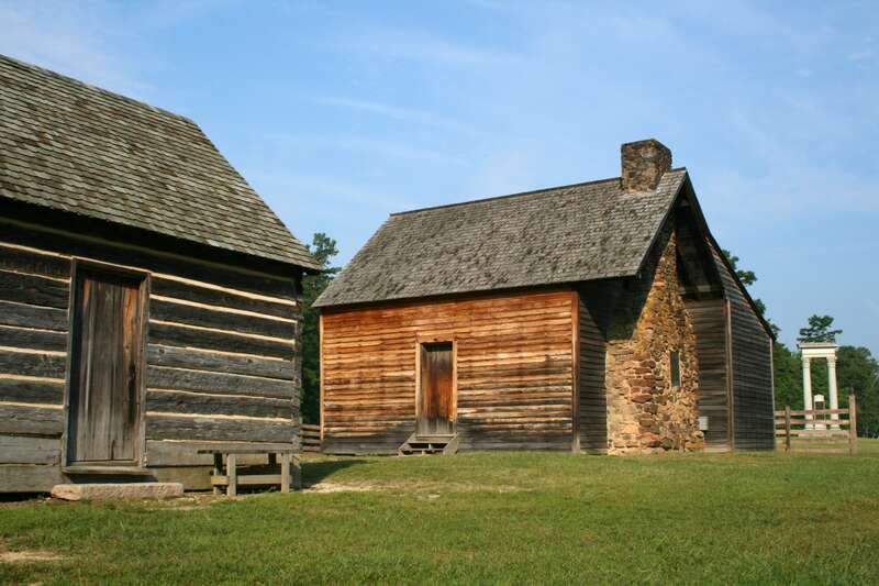 Bennett Place, a carefully reconstructed historic farm in Durham, North Carolina, the site of the largest surrender of Confederate soldiers during the American Civil War on April 26, 1865.  Showing, from left to right, the kitchen, the farmhouse, and