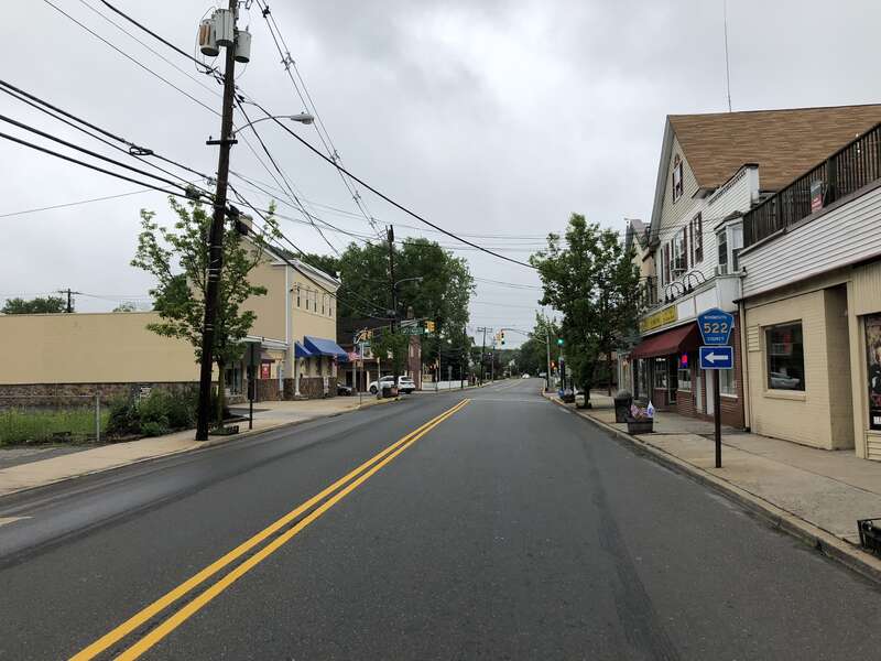 View west along Monmouth County Route 522 and north along Monmouth County Route 527 (Main Street) at Hamilton Street in Englishtown, Monmouth County, New Jersey