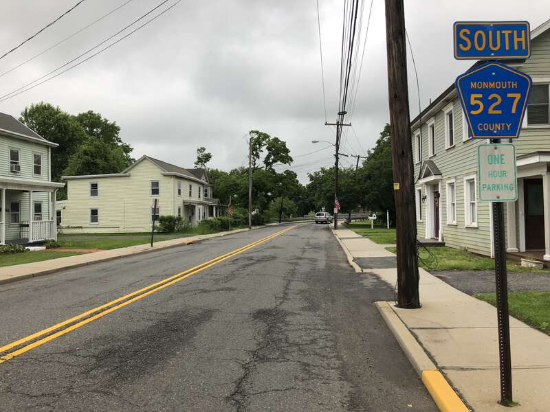 View south along Monmouth County Route 527 (Main Street) at Monmouth County Route 522 (Tennent Avenue) in Englishtown, Monmouth County, New Jersey