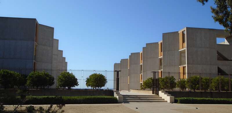 The view from the east of the Salk Institute at 10010 North Torrey Pines Road in La Jolla, San Diego, California. The institute was founded in 1960 by Jonas Salk, and its headquarters was built in 1966, and was designed by Louis Kahn in the Brutalist
