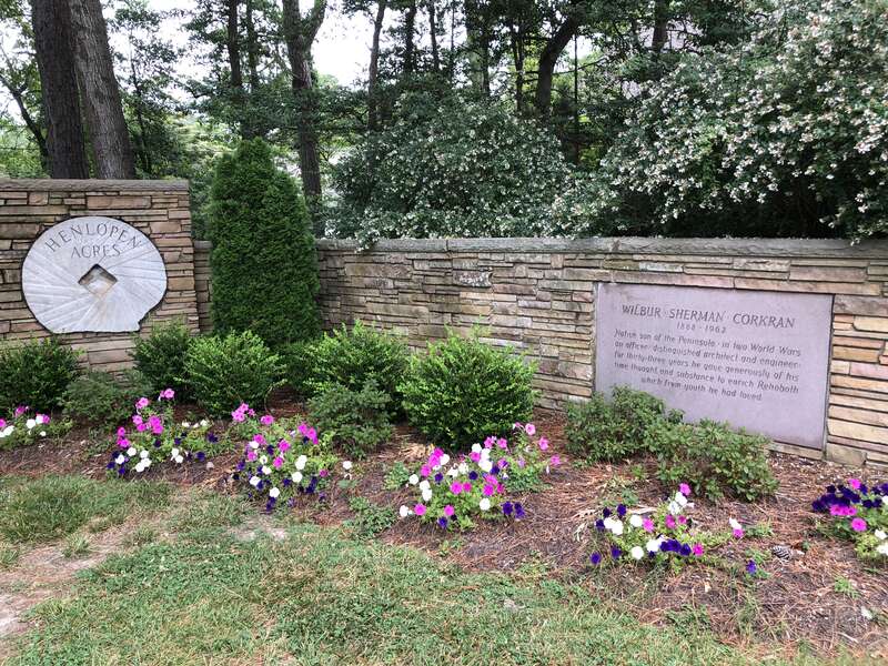 Signs and plaque at the entrance to Henlopen Acres along Dodd's Lane in Sussex County, Delaware