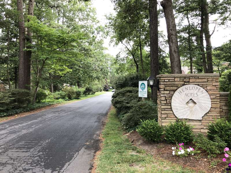 View northwest along Dodd's Lane at the entrance to Henlopen Acres in Sussex County, Delaware