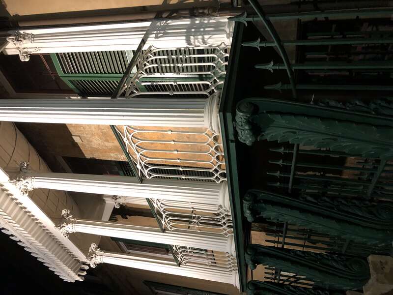 This is a photo of the side veranda featuring acanthus leaf supports at the Owens-Thomas House in Savannah, Georgia. General Lafayette addressed the citizens of Savannah on his visit in 1825 from this veranda.