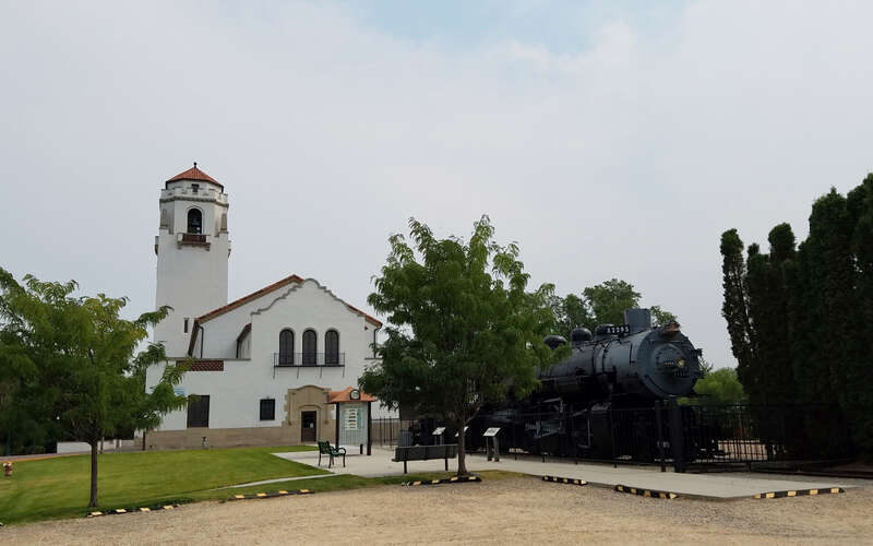 A view of Boise Depot and &quot;Big Mike,&quot; an MK-9 Heavy class, type 2-8-2 Mikado built in 1920 by the American Locomotive Company.