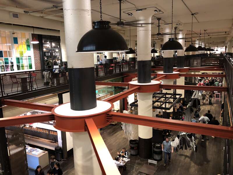 The Central Food Hall at Ponce City Market repurposes a renovated industrial space as a food court and meeting area.