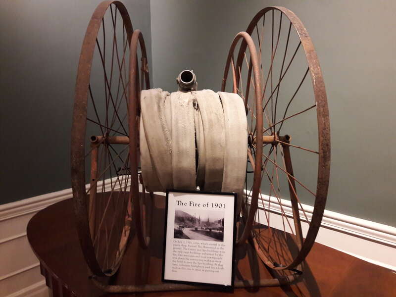 This is a fire hose with accompanying informational placard at the Omni Homestead in Hot Spring, Virginia.