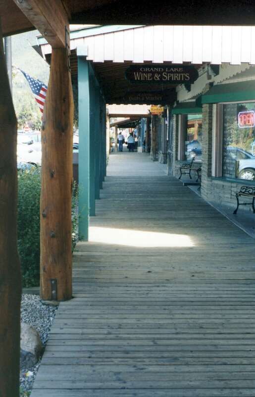 (1 in a multiple picture set)
The uptown area of Grand Lake, CO is a shoppers' paradise with many stores.  All the buildings have an Old West feel to them, as shown by this shot of the board walks.