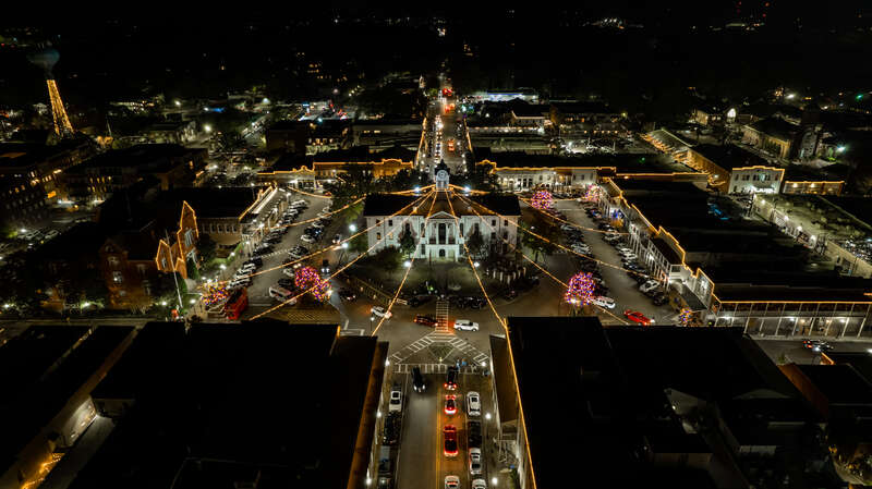 The beautiful Oxford Square lit up with lights for the holiday season.