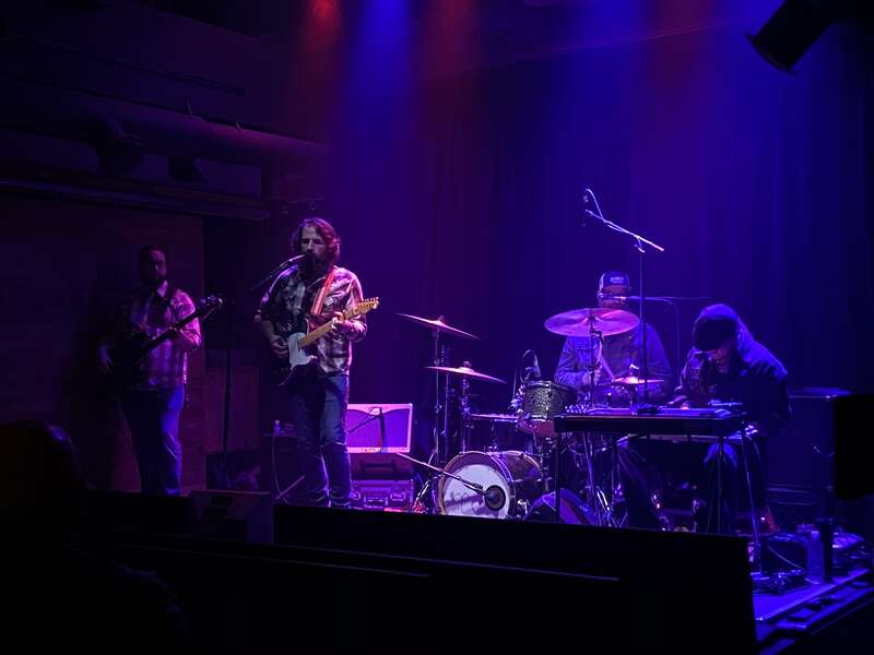 A photo of the band Kenny George Band performing live in 2020.