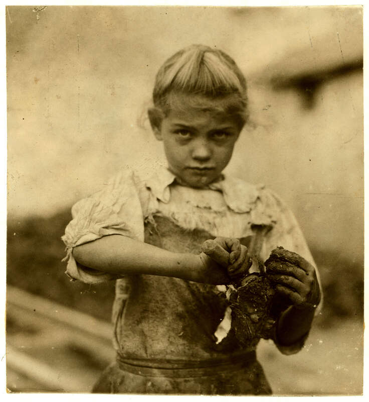 7-year old Rosie. Regular oyster shucker. Her second year at it. Illiterate. Works all day. Shucks only a few pots a day. (Showing process) Varn &amp;amp; Platt Canning Co. Location: Bluffton, South Carolina. Photograph by Lewis Wickes Hine, February