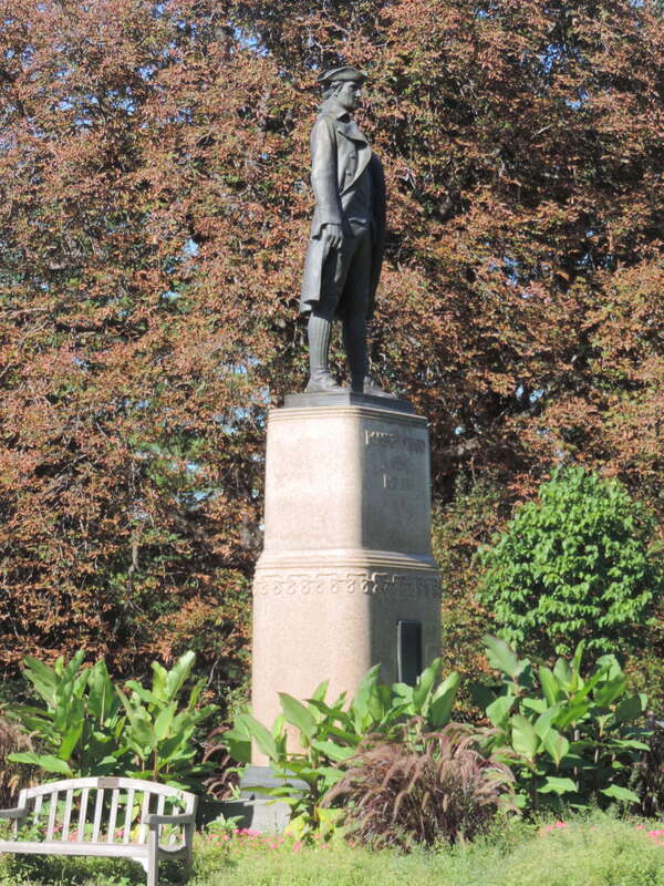 Looking west at Randall monument, late on a sunny morning. Base is by Stanford White.