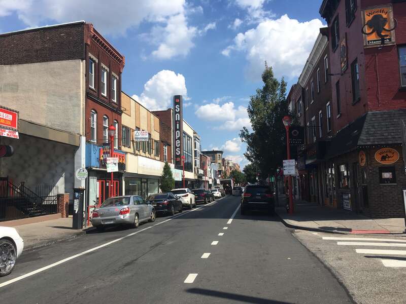 Eastbound South Street past the intersection with 5th Street in Philadelphia, Pennsylvania