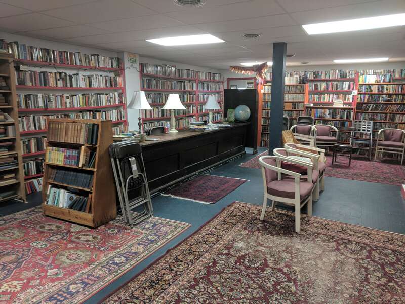 The Bookplate, a bookshop on South Cross Street in Chestertown, Maryland, featuring fine books, fine art, and a cat.