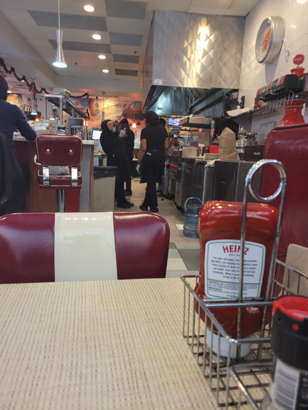 Sitting a table at the burger retro diner in The Mills at Jersey Gardens Mall in Elizabeth New Jersey