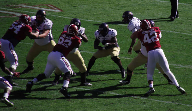 The Alabama Crimson Tide football defensive line in action against the Western Carolina Catamounts in November 2012. Visible for Alabama are Jesse Williams (No. 54), Damion Square (No. 92) and Adrian Hubbard (No. 42).