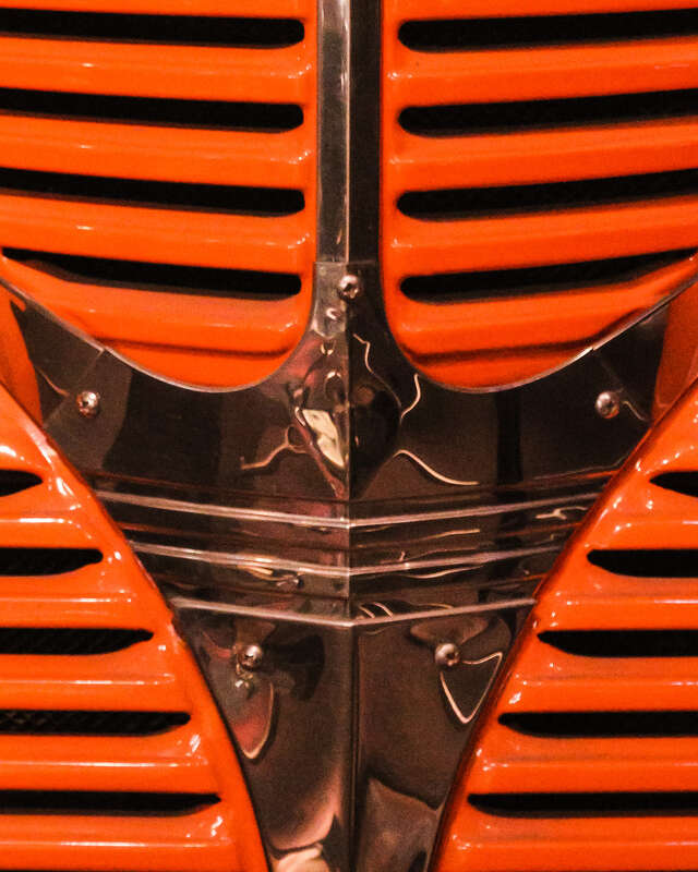 500px provided description: The National Museum of American History hosts this classic example of American automotive creativity.    Enjoy! [#car ,#transportation ,#orange ,#history ,#truck ,#classic ,#chrome ,#historic ,#grill ,#Dodge]