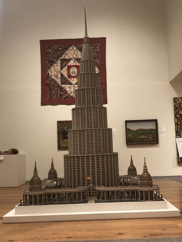 Encyclopedic Palace sculptural model view from entrance with a tiny flag of Spain. Model created by Marino Auriti. Collected by the American Folk Museum at New York, loaned to the Portland Museum of Art as part of the temporary &quot;American
