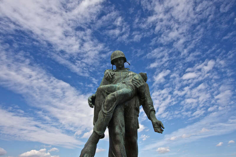 500px provided description: Liberation, a statue at Liberty State Park in New Jersey, depicts a US soldier carrying a holocaust victim from a Nazi death camp. [#Monument ,#Statue]