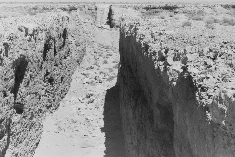 Mormon Mesa, Nevada
Double Negative is Michael Heizer's first prominent earthwork. Seen above from near the edge of the work, and below from space via satellite, Double Negative consists of two trenches cut into the eastern edge of the Mormon Mesa,