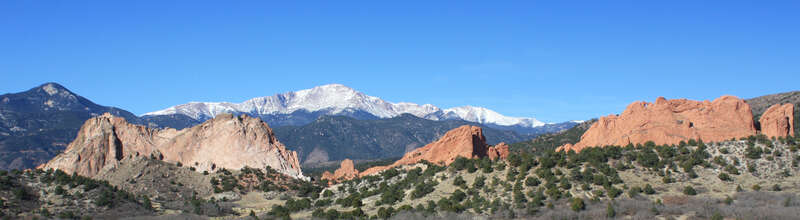 Taken from the Garden of the Gods visitor center. You can see the "hole in the rock" at the right 1/4.
