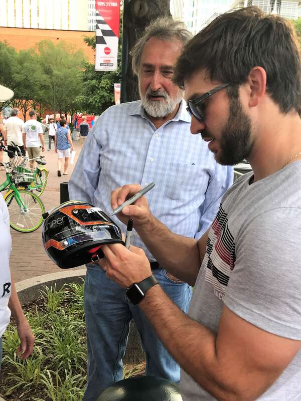 Daniel Suárez signing autographs at Speed Street downtown Charlotte, NC