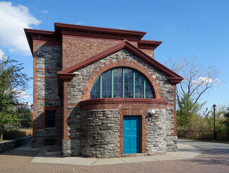 The south end of the Strecker Memorial Laboratory at the east side of Southpoint Park, at East Road south of South Loop Road at approximately Manhattan 53rd Street in the southern half of Roosevelt Island, Manhattan. Originally constructed in 1892,