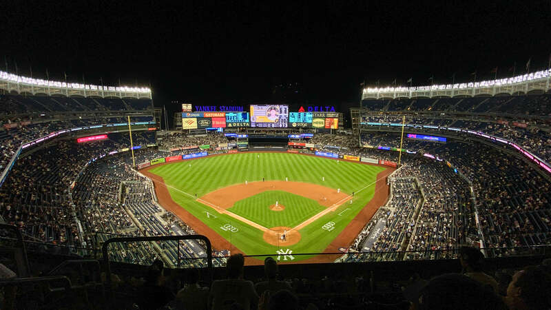 A picture of Yankee Stadium during a game between the Yankees and Pirates.