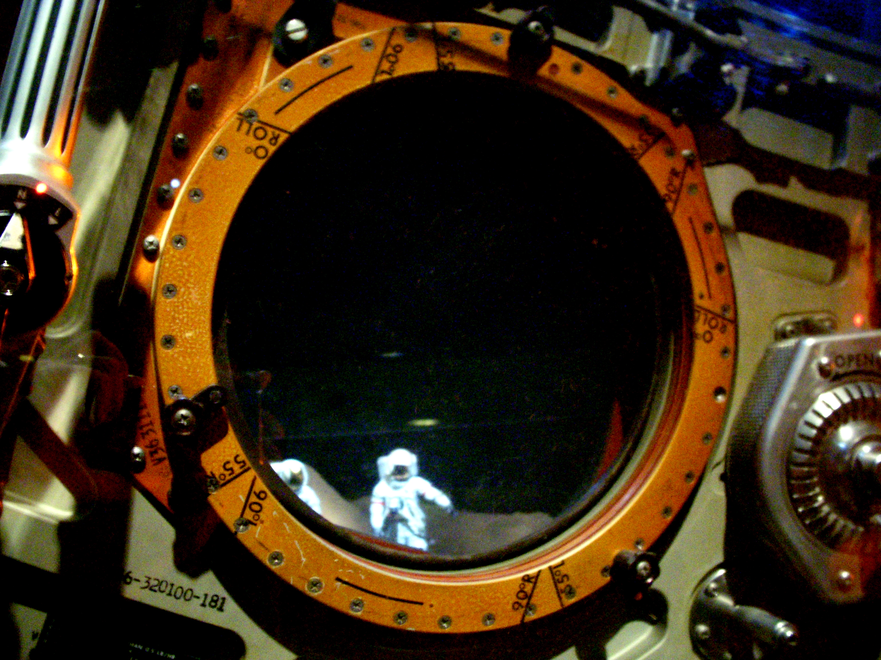 Looking out the porthole onto the &amp;lt;a href=&quot;https://www.flickr.com/photos/jdhancock/3724844463/&quot;&amp;gt;lunar surface&amp;lt;/a&amp;gt;.
Seen during a visit to NASA's Johnson Space Center in Houston, Texas.
--
Purchase this image and learn more about it at the
