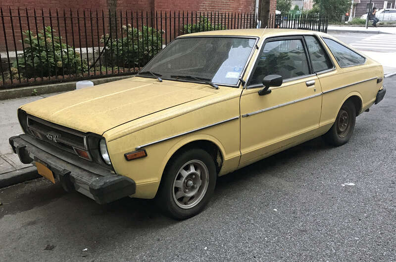 A 1979 Datsun 210 Coupé (hatchback) in Brooklyn's Williamsburg neighborhood.