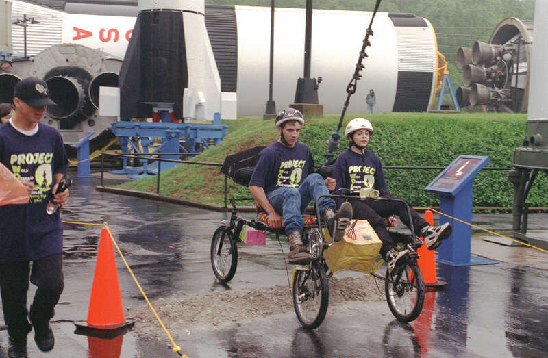 Monterey High School, Monterey, Louisiana competes in the soggy 1998 Great Moonbuggy Race.