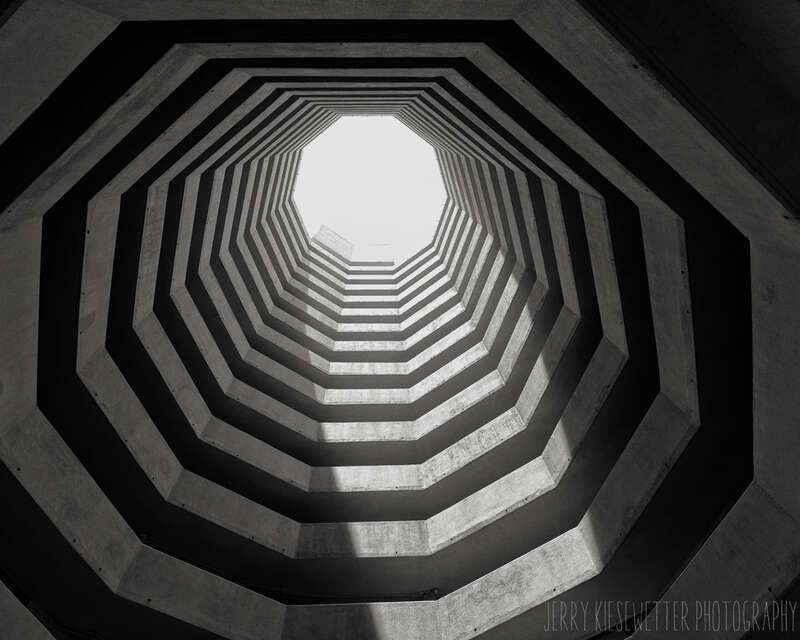 500px provided description: Looking Up...
This photo is available for FREE to use as you see fit on Unsplash

unsplash.com/photos/3e8NMeH8JdI [#sky ,#city ,#travel ,#buildings ,#urban ,#architecture ,#black and white ,#geometric ,#minimalism ,#stock