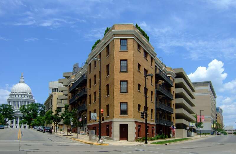 The Baskerville Apartment Building (1913-14) is one of Madison's finest remaining early apartment houses, built in an era of population explosion caused by enlargement of the University of Wisconsin, state government, and private industry.  Downtown