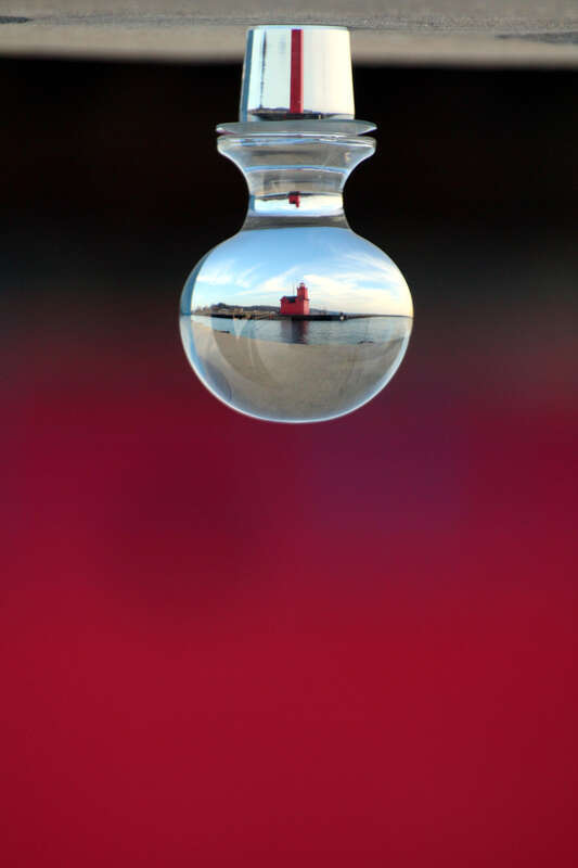 Took my Glass Bottle Stopper from a Decanter to play with today.  Turned the image 180 degrees.
There is about the length of a football field distance from my glass stopper to Big Red!

&amp;lt;a href=&quot;http://holland.org/locations/372-big-red-lighthouse&quot;